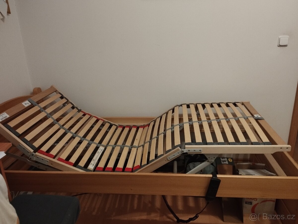Polohovací elektrická postel