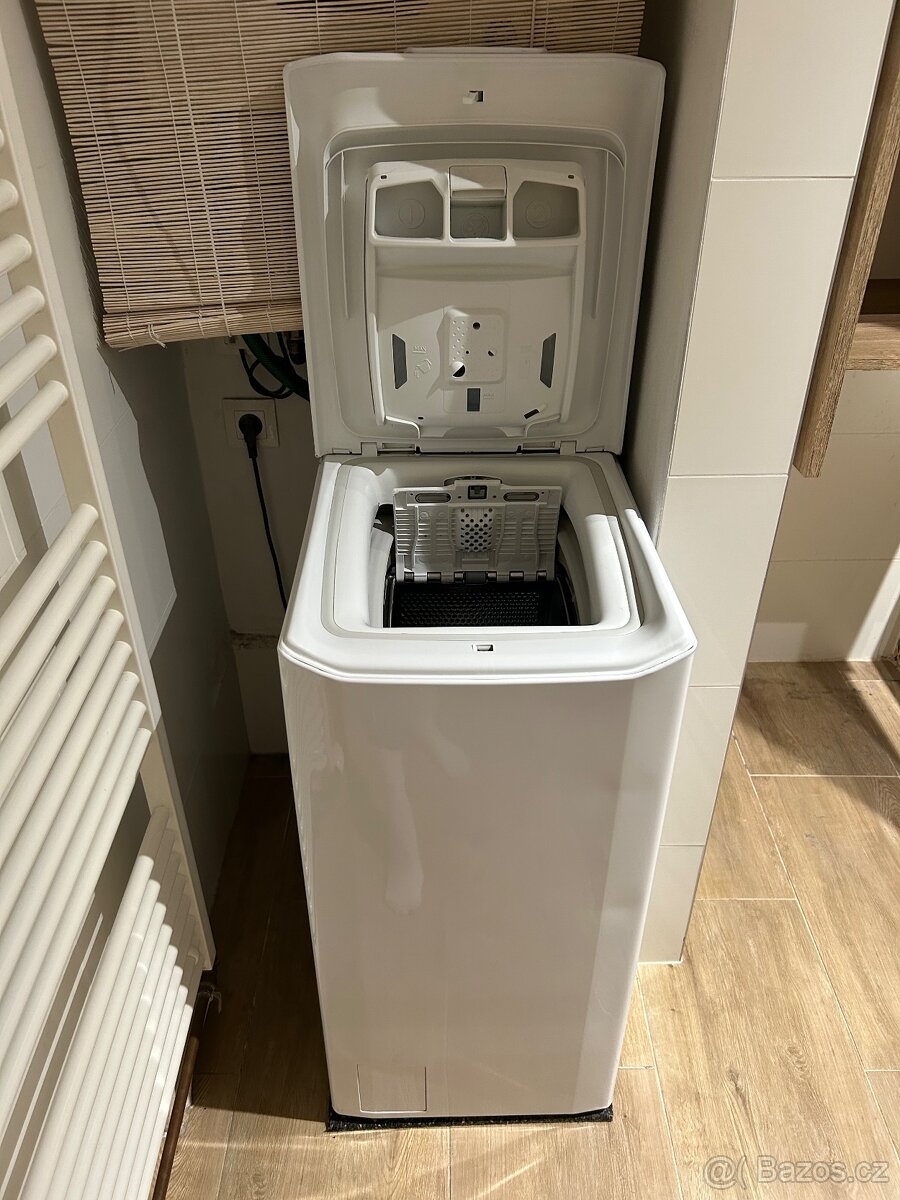 Pračka s vrchním plněním ETA
