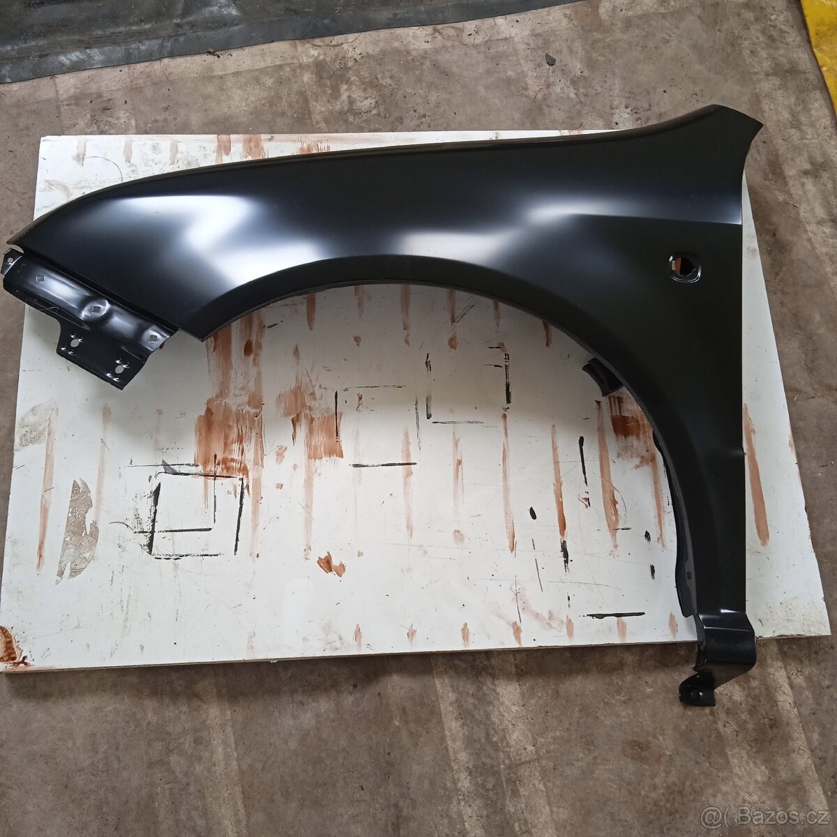 Přední levý blatník nový Škoda Fabie 1.