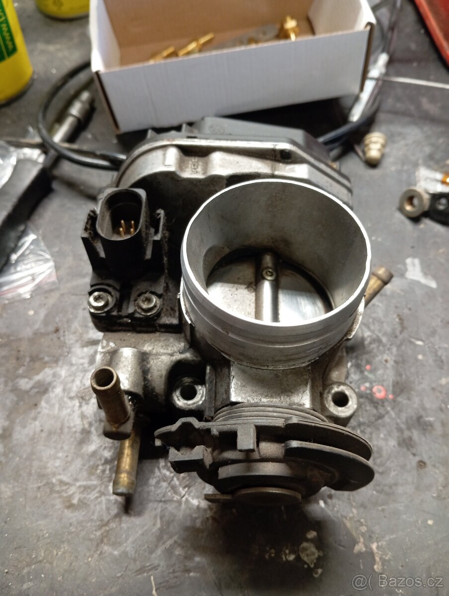 Škrtící klapka Octavia 1.6 74kw