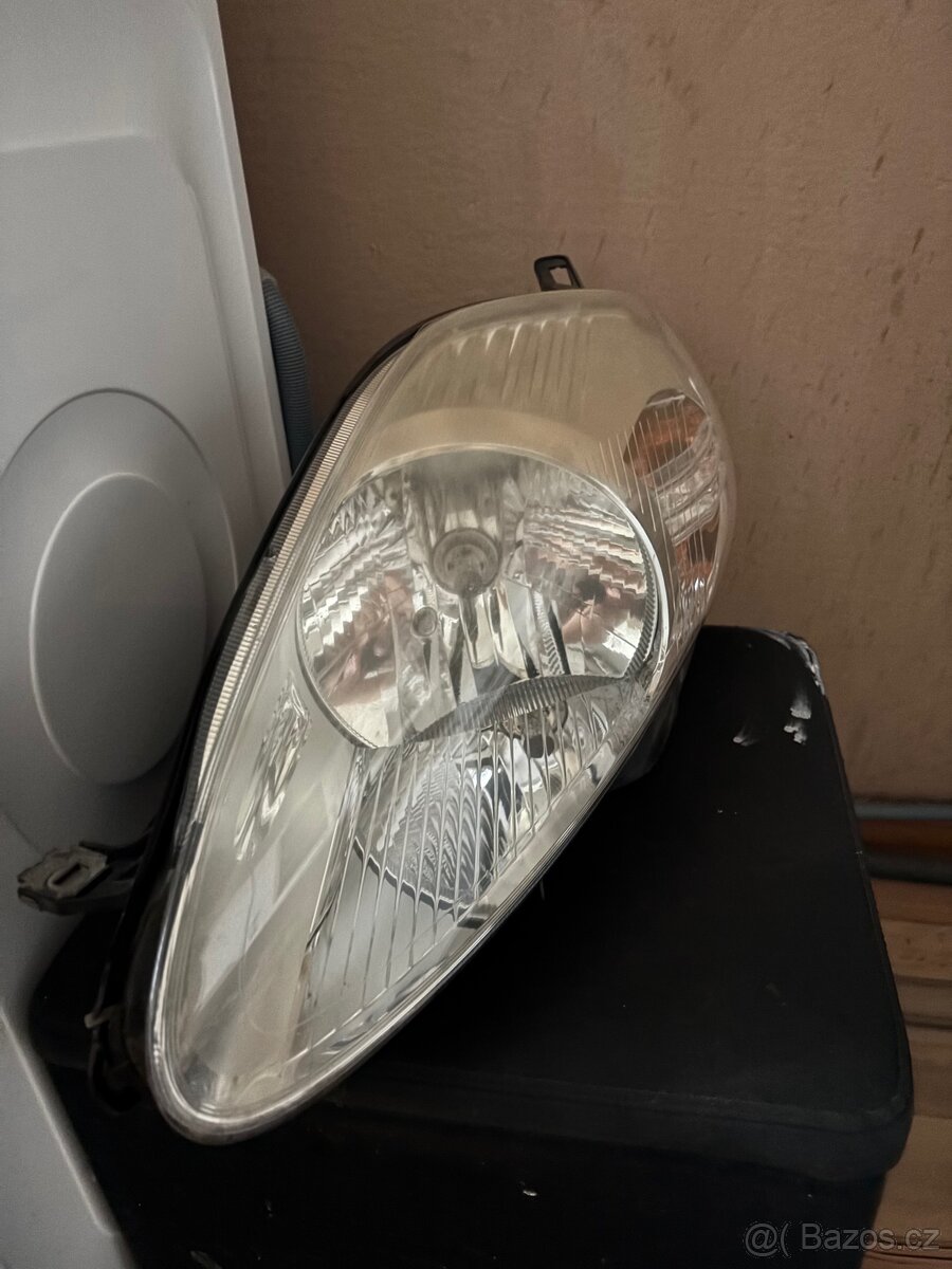 Levé přední světlo Grande Punto