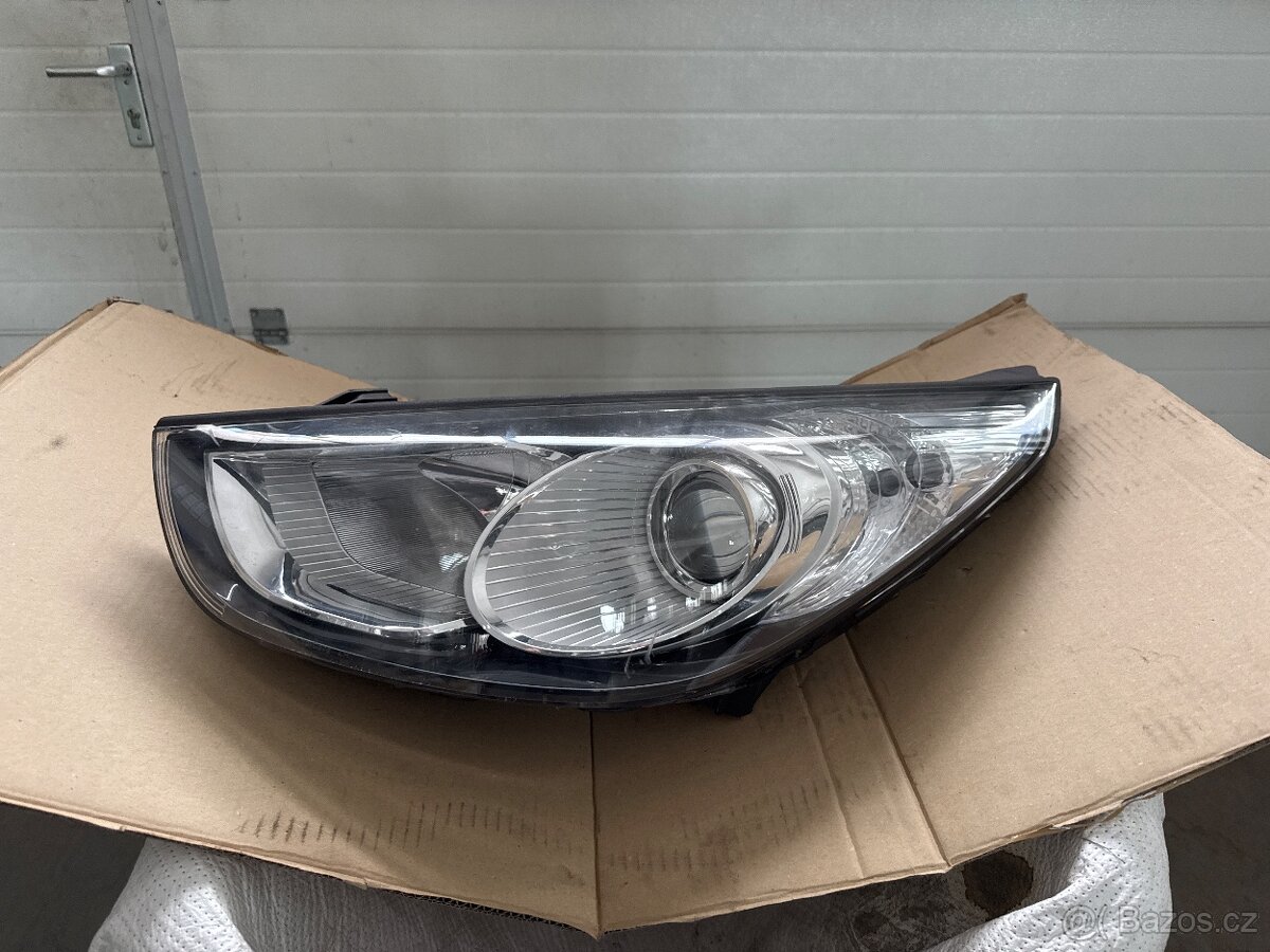 Hyundai ix 35 levé světlo utržený držák