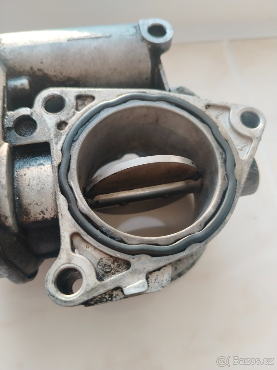 Škrtící klapka 2.0 125kw BMR  03G128063B