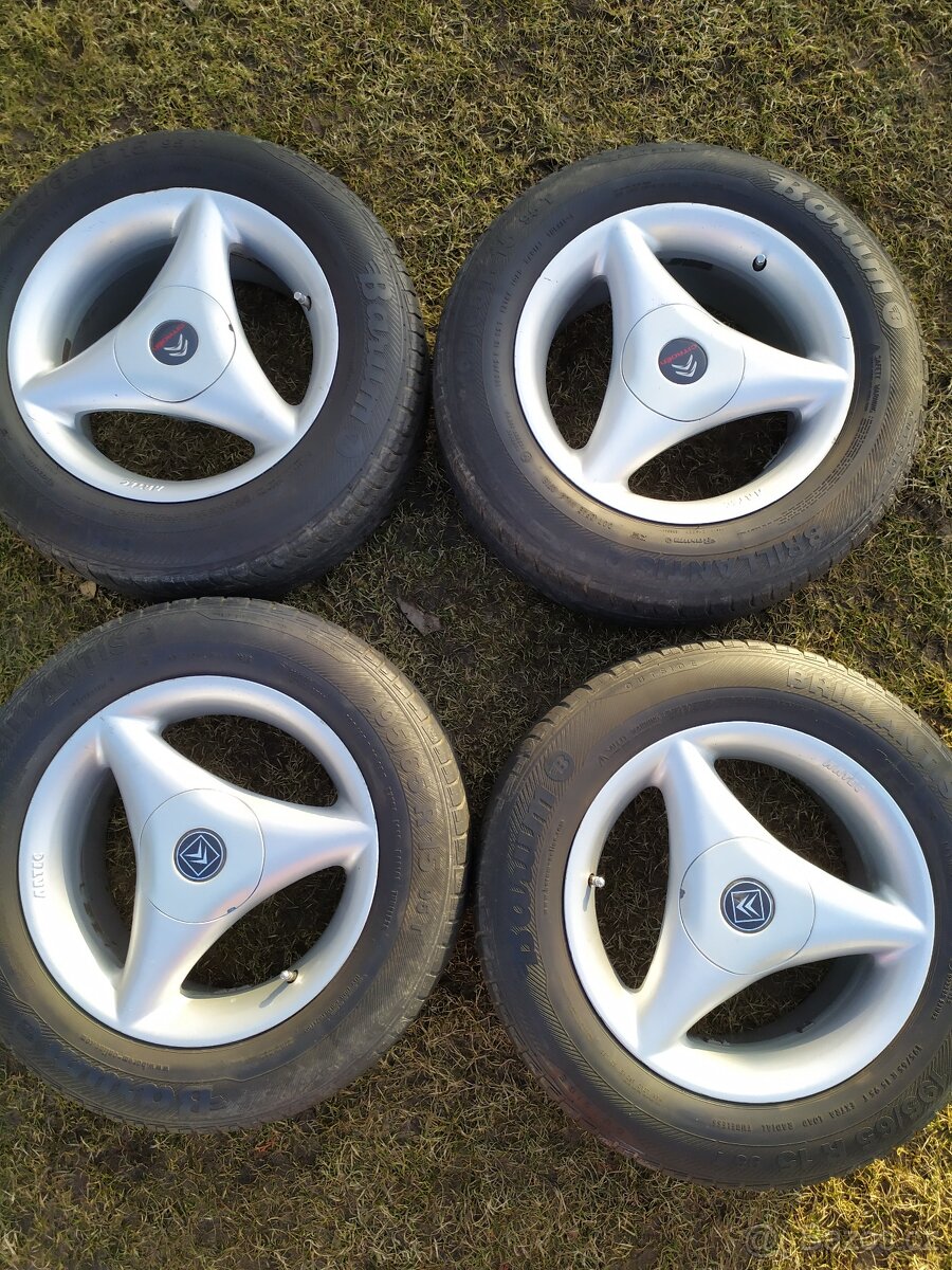 Třípaprsková alu kola Artec 7Jx15H2,rozteč 4x108