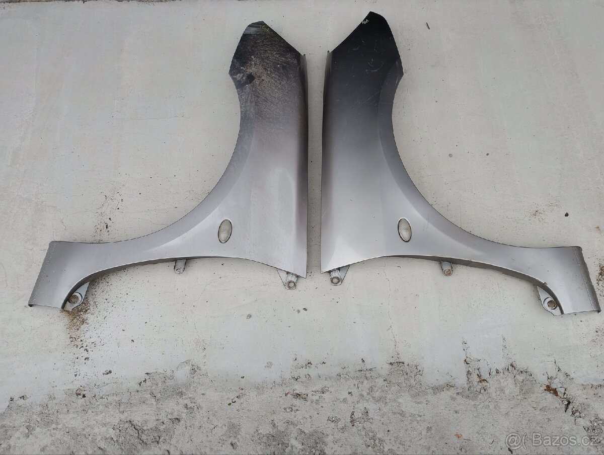 Přední blatníky Opel Meriva plastové (díl na lak)