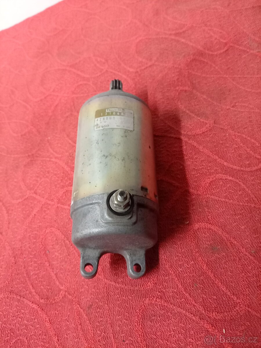 Startér Triumph 1050.