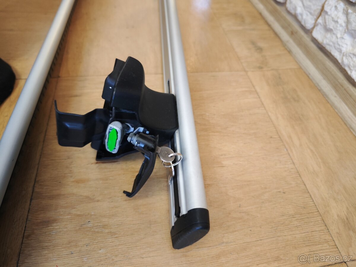 Prodám střešní nosiče Thule.