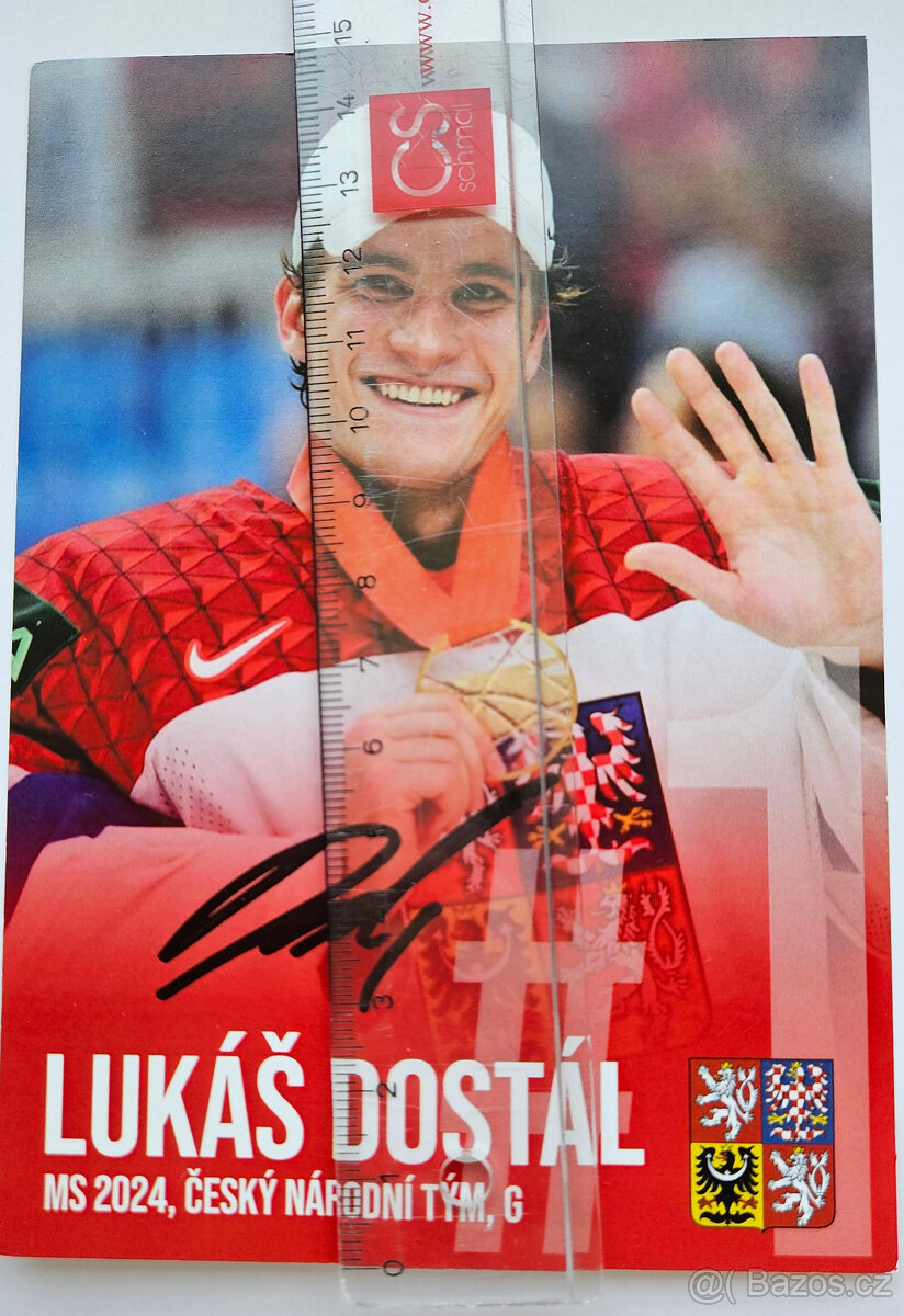 Podepsaná fotografie hokejisty Lukáše Dostála z MS 2024