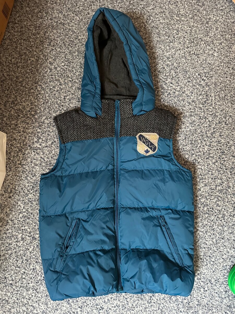 Teplá vesta vel. 128