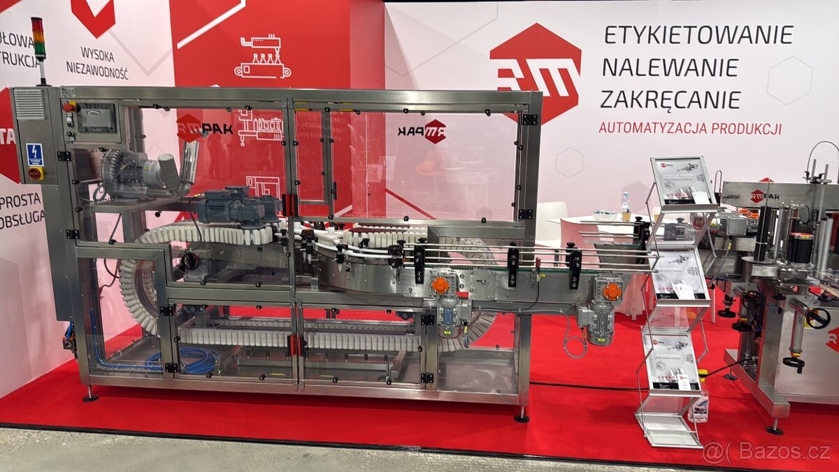 Automatický vyfukovací stroj na obaly