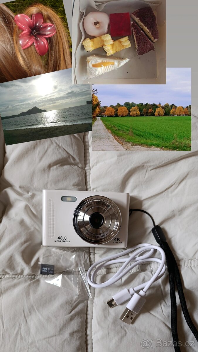 Bílý digitální fotoaparát