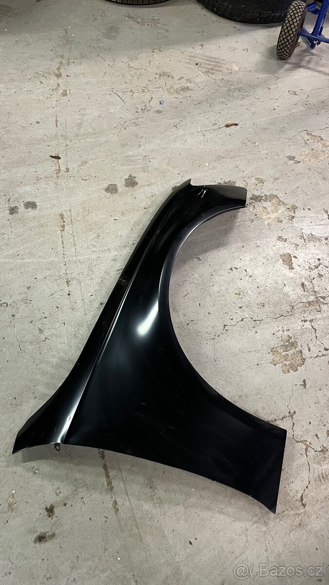 Mazda 3 pravý přední blatník