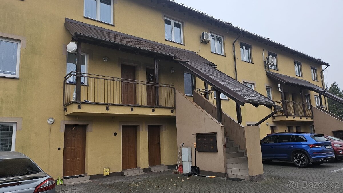 Byt 2+kk s garáží