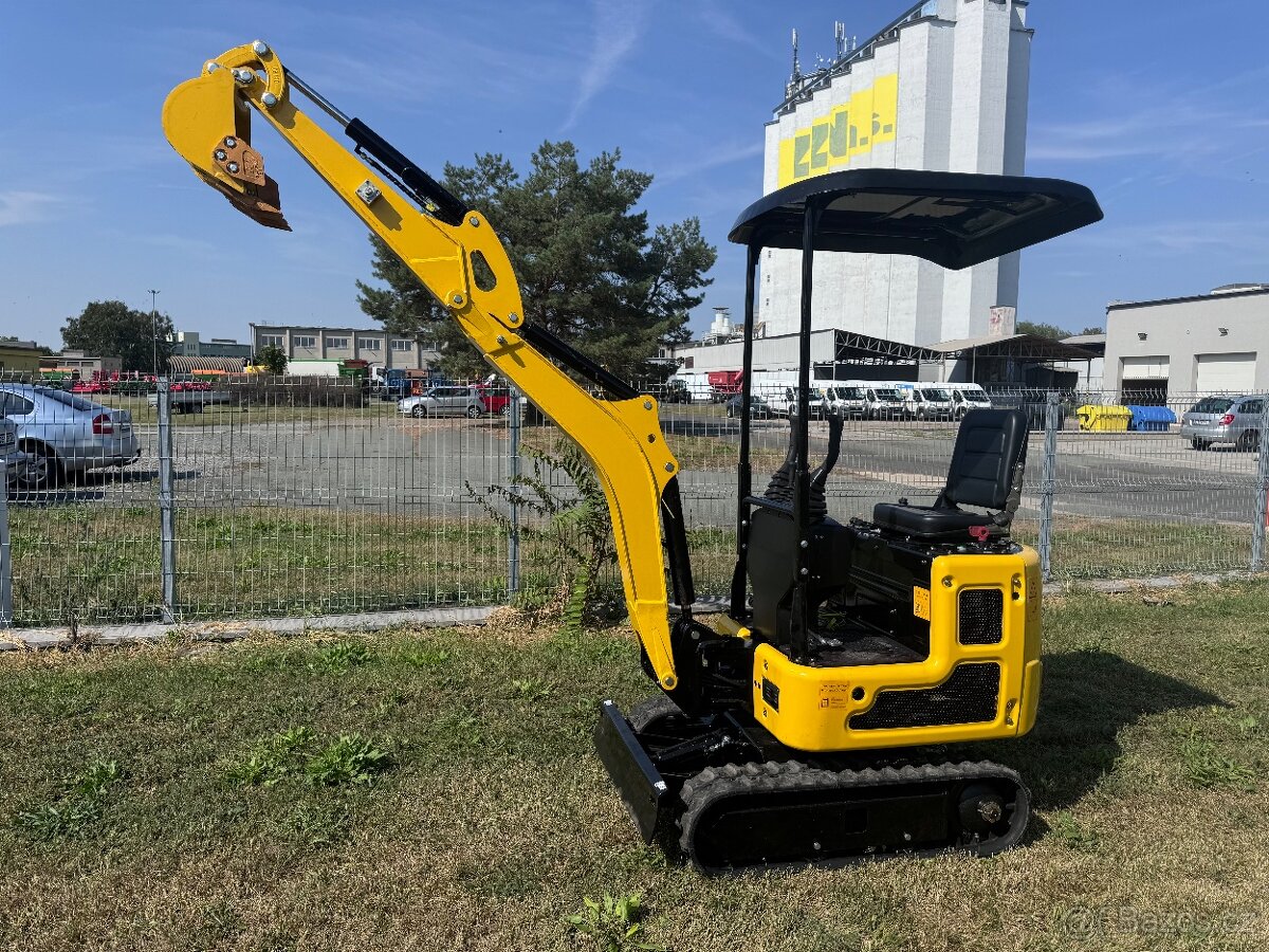 Minibagr bagr D955 rypadlo pásový bagr