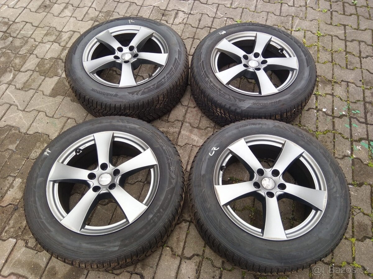 Pneu včetně ráfků 235-65R18 107H