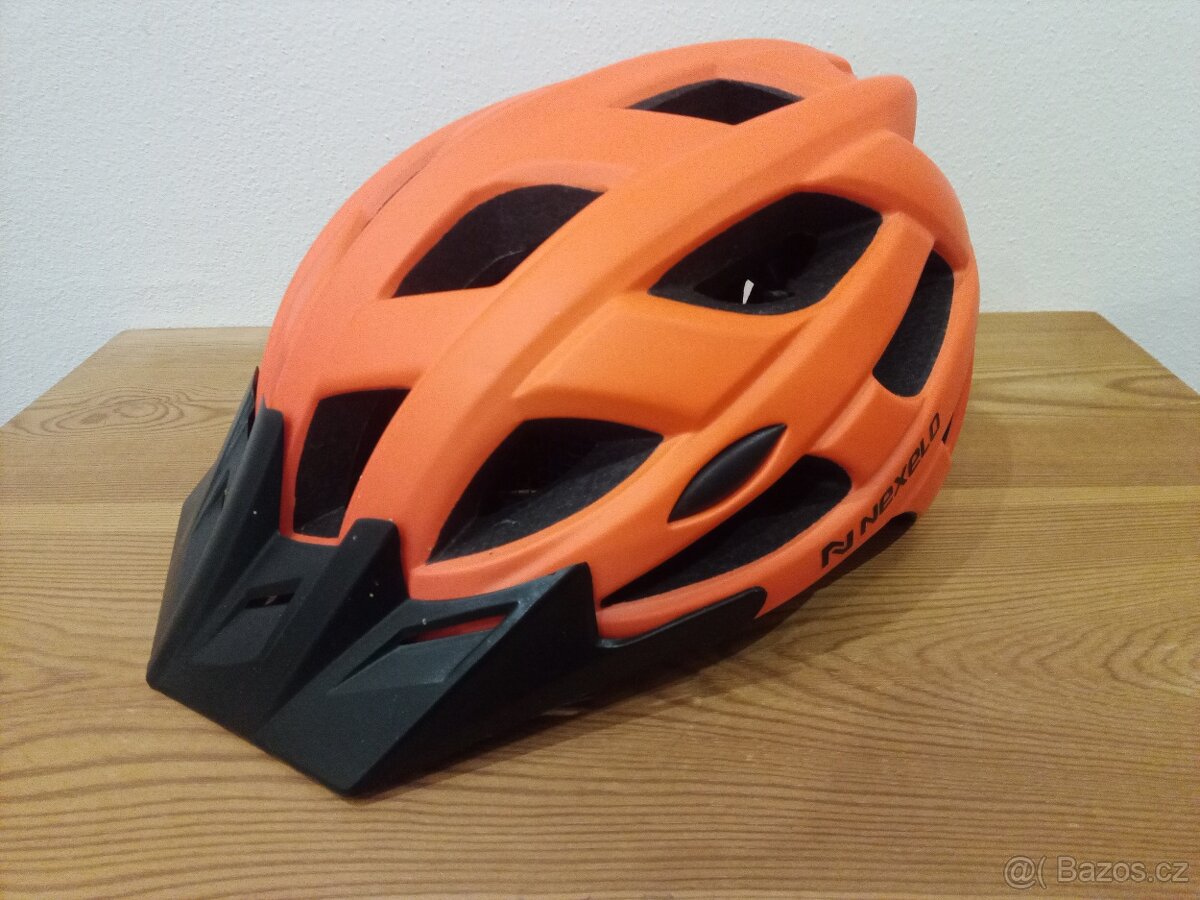 PŘILBA NA KOLO NEXELO CITY ORANŽOVO-ČERNÁ MATNÁ M 55-58CM