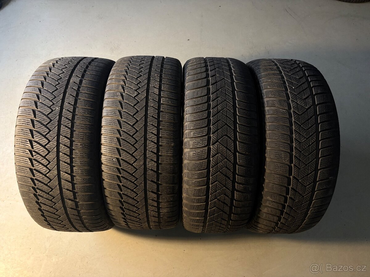 Zimní pneu Continental + Pirelli 245/45R18