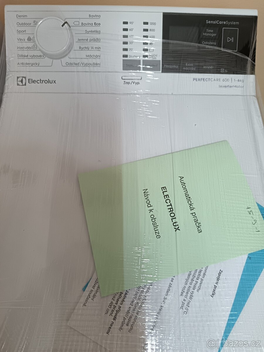 Vrchem plněná pračka Electrolux