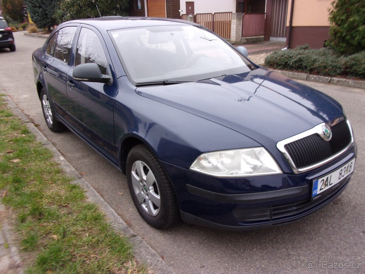 Octavia 1,4i 16V 59kW Tour,koup.v čr 9.2011,klima,závěs