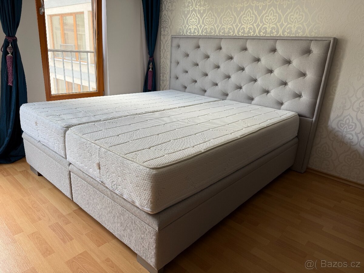 Čalouněná kontinentální postel s úložným prostorem