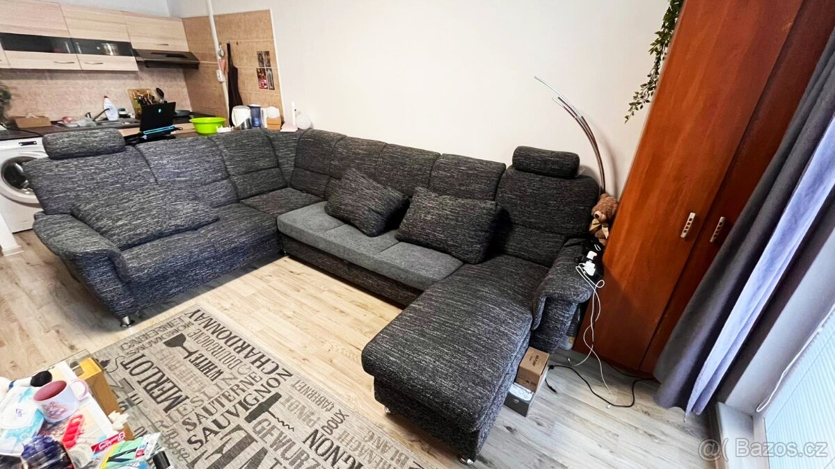 Rohová rozkládací sedací souprava