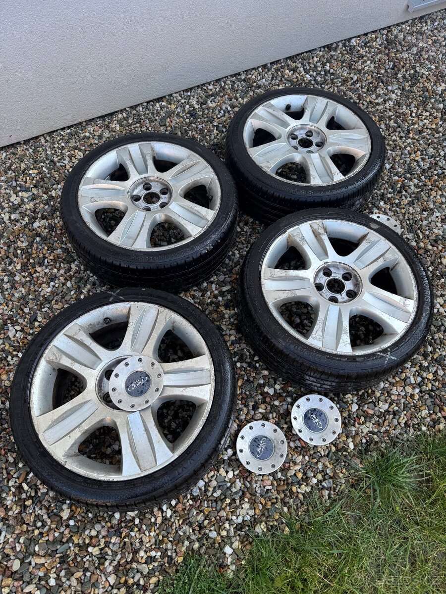 ALU kola Ford s pneumatikami Bravuris 3 R18