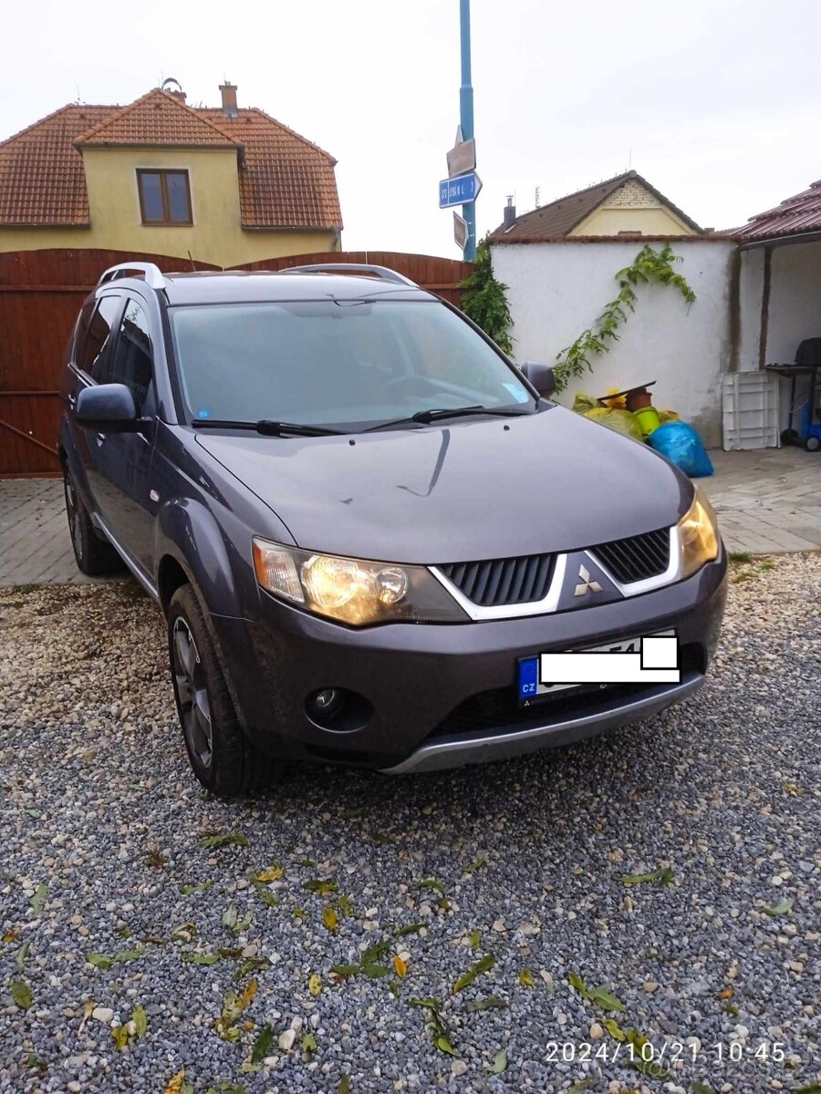 mitsubishi oukledr 2,0 dcti 103 kw. cena 85000kč.