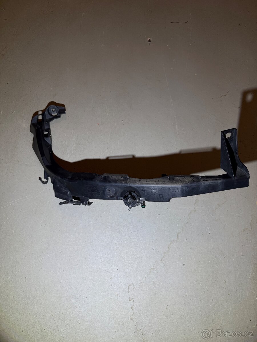Bmw e90 spodní držák xenonu