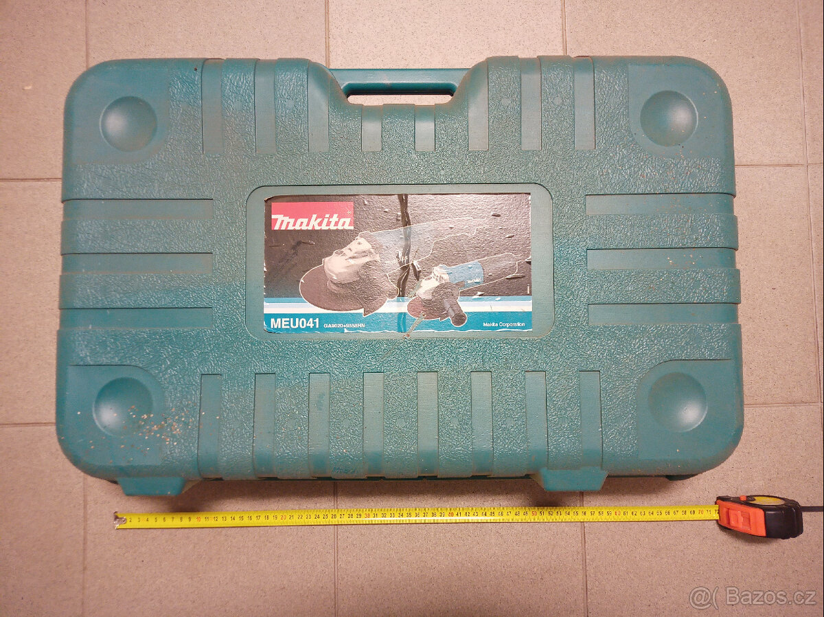Makita modrozelený plastový kufr MEU041 na brusku