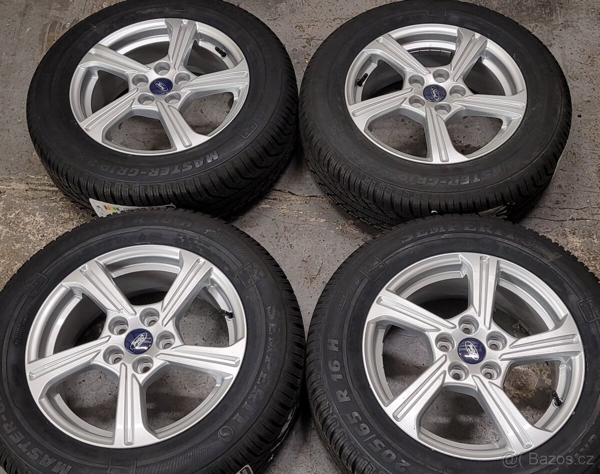 Ford Puma,16' alu disky,zimní pneu,nové Semperit
