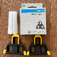 Prodám Silniční bloky Shimano SPD-SL - žluté, 6 stupňů vůle