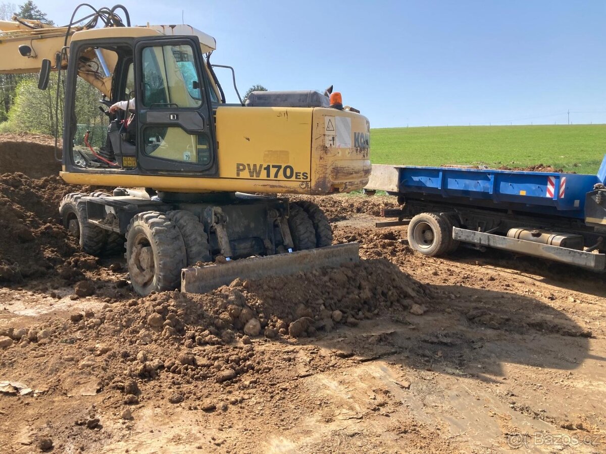 Komatsu SAA4D102E Kolové Rypadlo