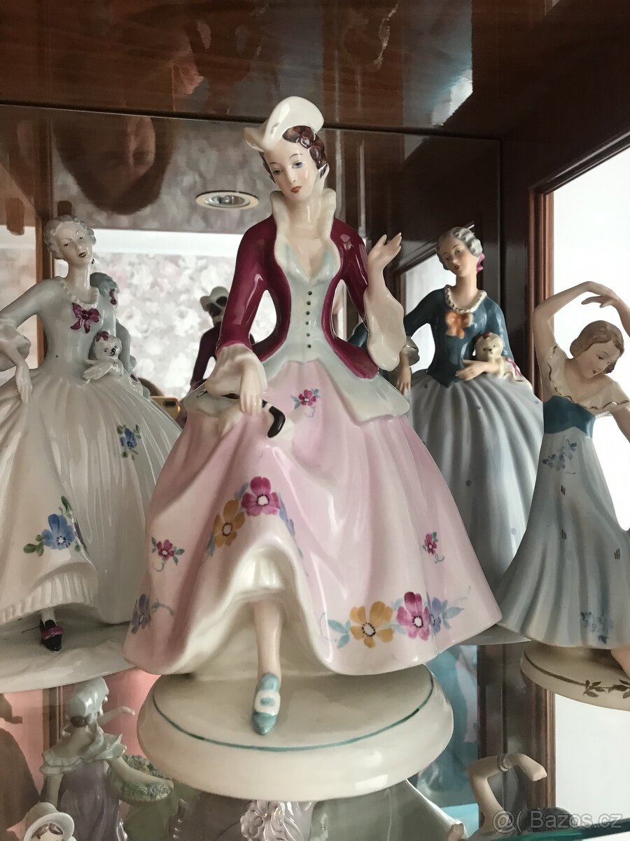 porcelán Dux dáma s bičikem