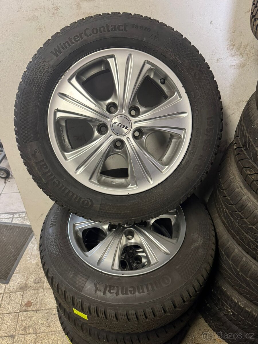 Sada Alu +zimni pneu Opel Astra  15"
