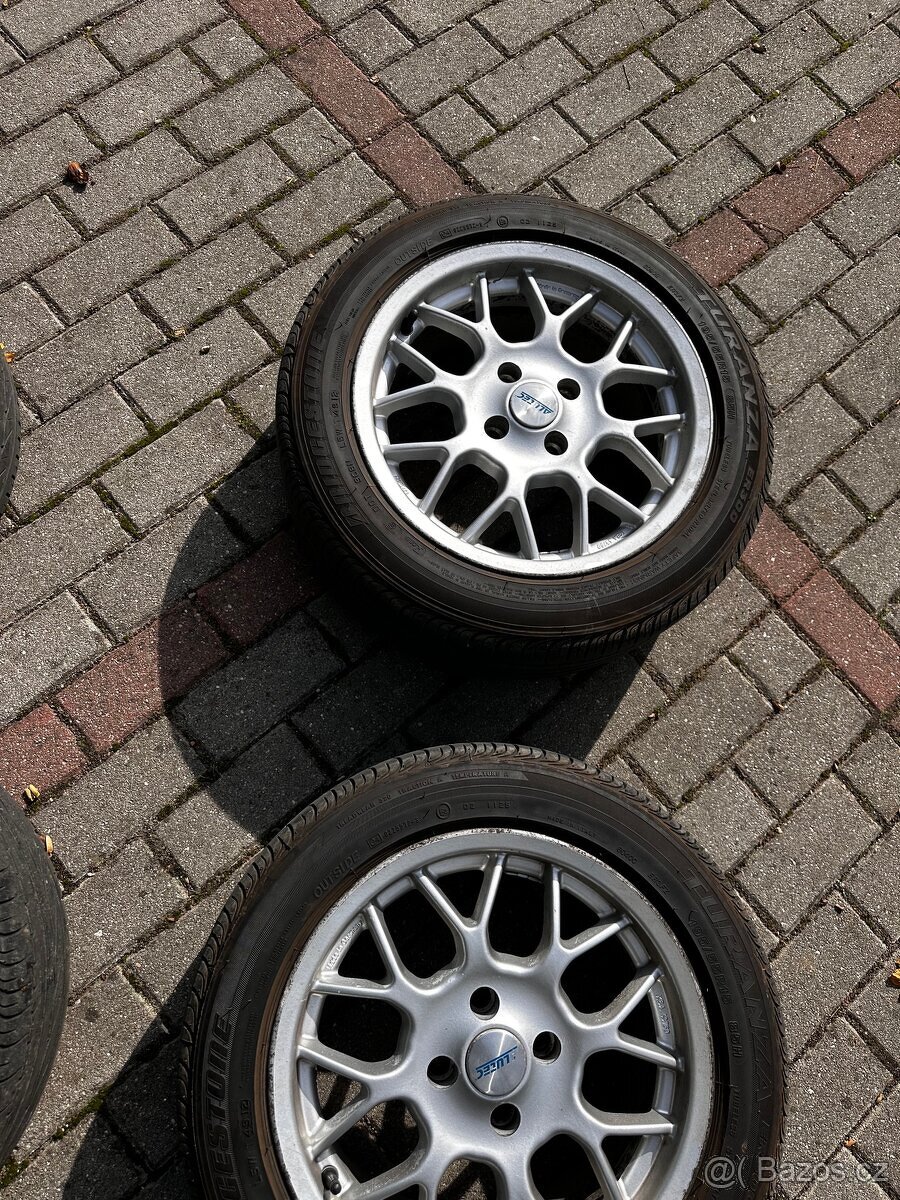 Alu kola Stilauto 15 4x100 s letními pneu Bridgestone