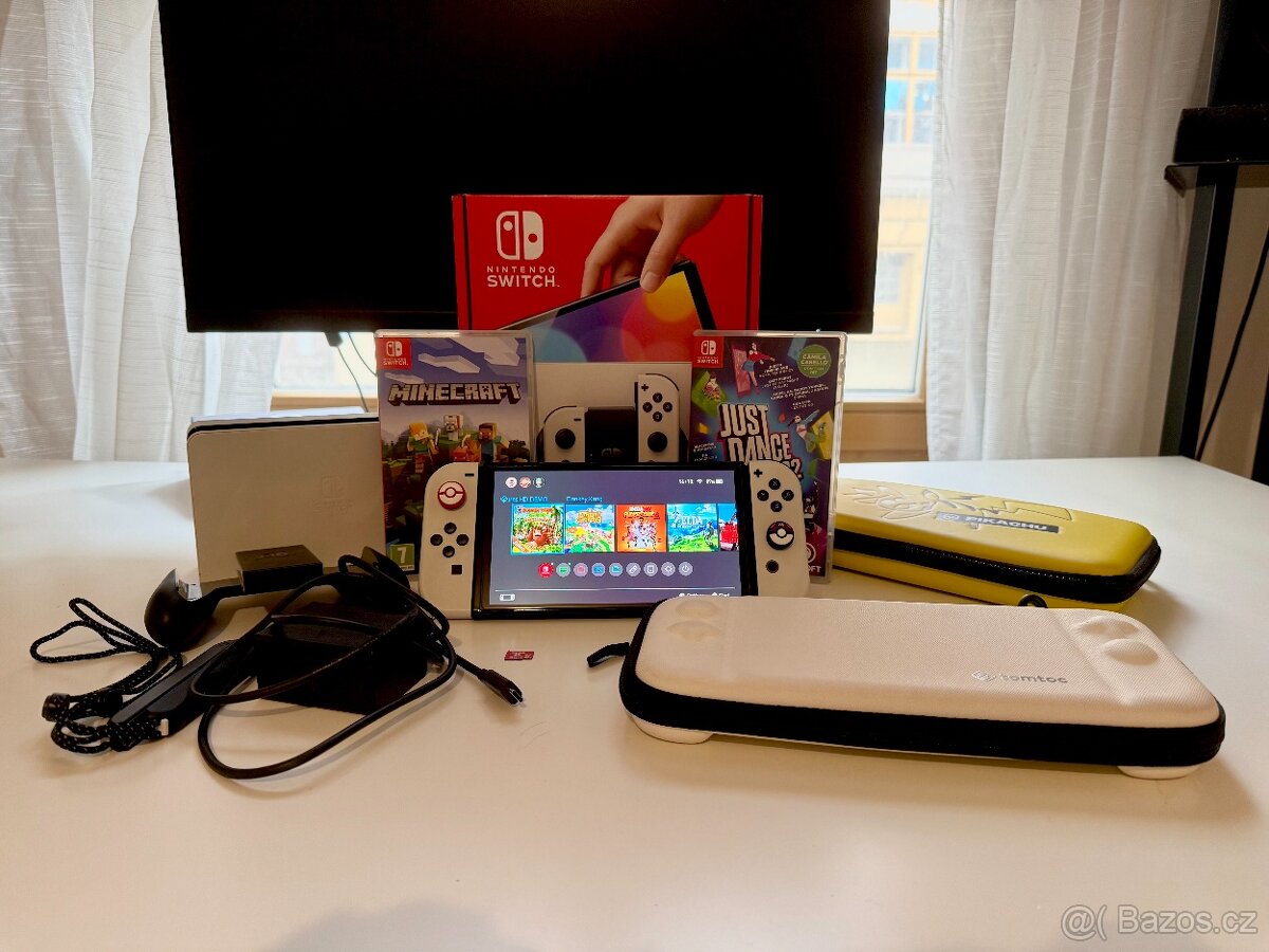 Nintendo Switch OLED bilý + SD karta + 2 pouzdra + 2 hry