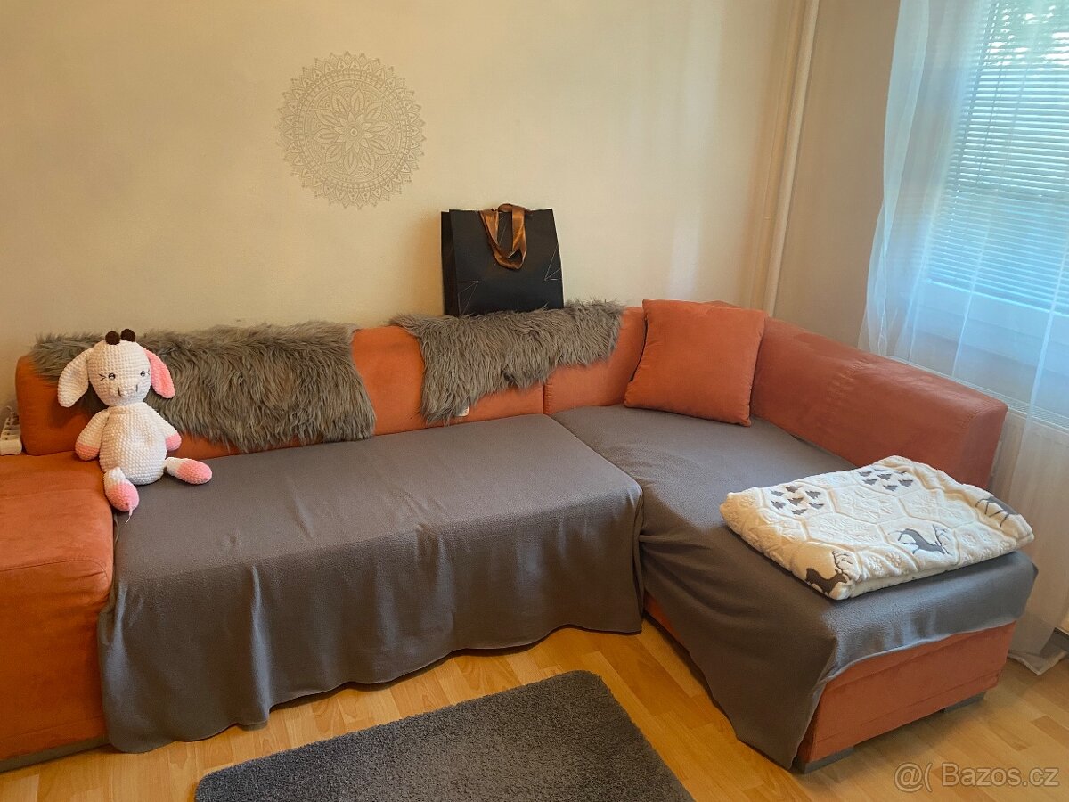 Rohová rozkládací sedačka