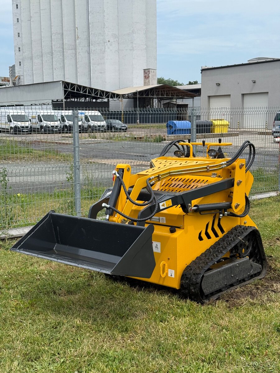 Stavební Mininakladač 950T2 pásový přepravník radlice