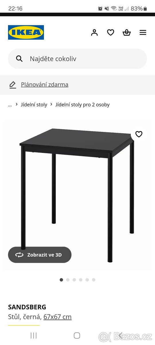 Černý stůl se dvěma židlemi