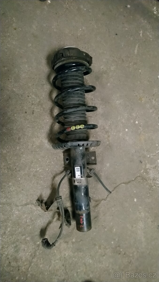 Levý přední tlumič Škoda Fabia 2