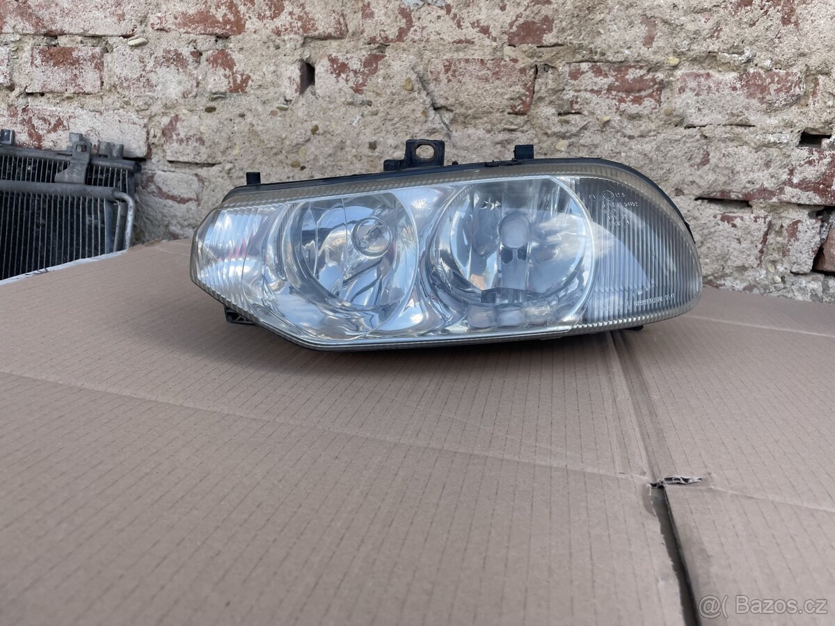 Přední světlo alfa Romeo 156