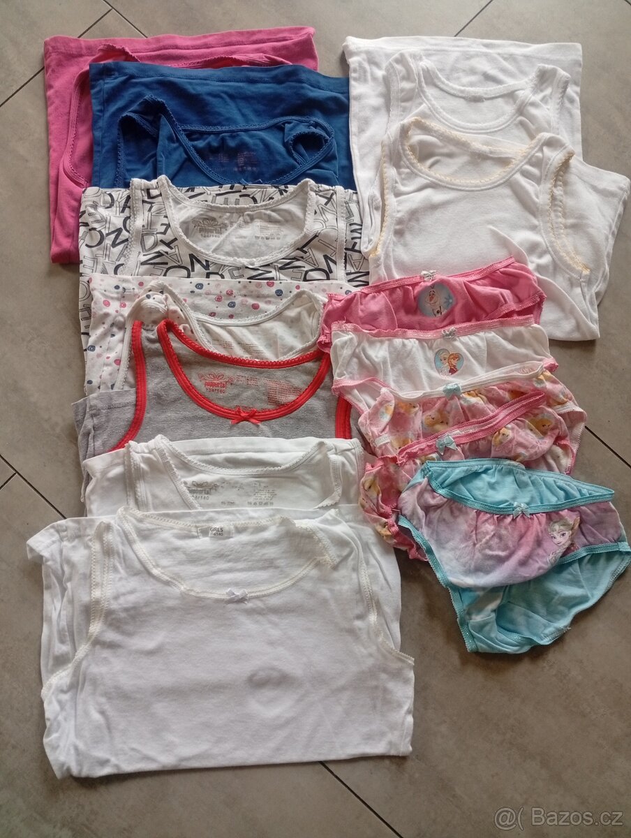 Dívčí tílka vel.134/140 9 Ks