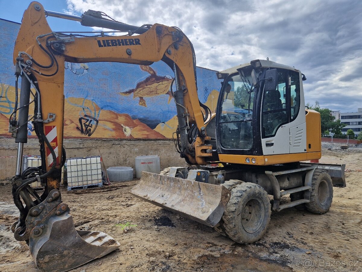 Kolové rypadlo LIEBHERR 912 kolový bagr LIEBHERR A912