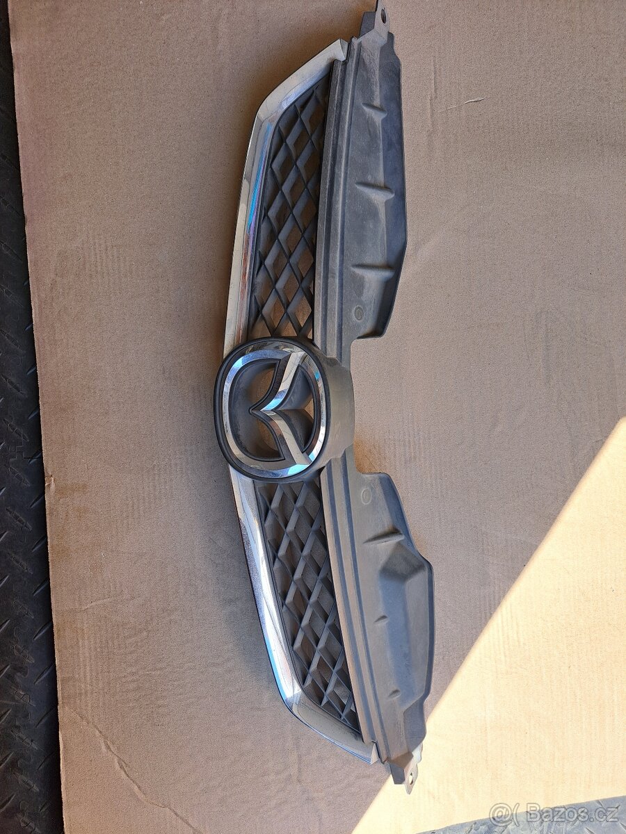 Mřížka nárazníku, kapoty Mazda 5 od r.v. 2005