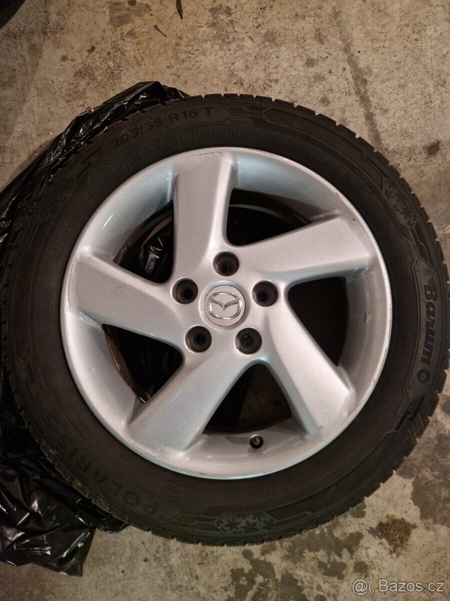 Sada Mazda ALU disků se zimními pneu 205/55 R16
