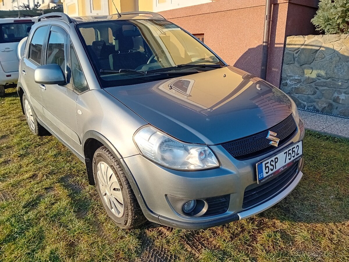 SX4 1,6i terénní 4x4,klima,tažné, výhřevy, r.v.2009