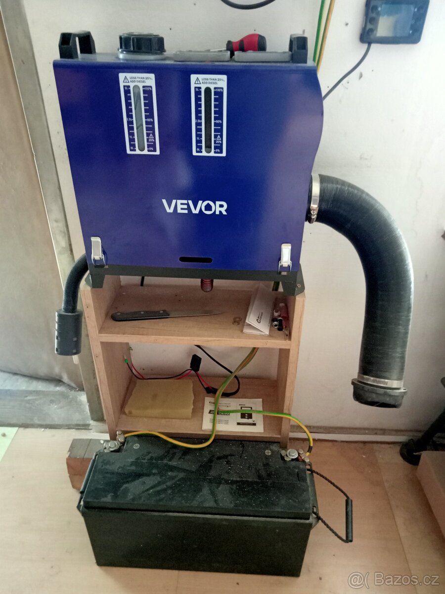 Naftové topení+solární nabíječka