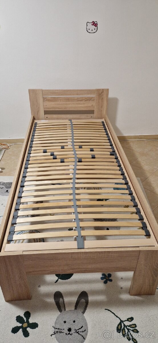 Prodám postel 90x200 s roštem. Cena 2500 kč
