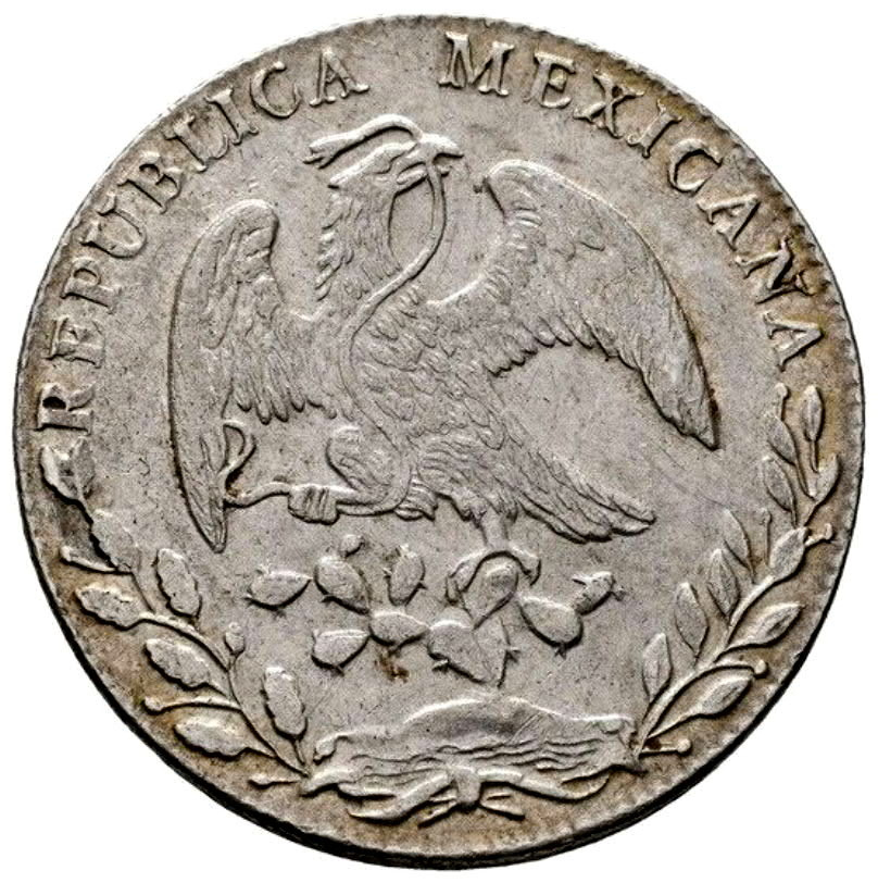 stříbrná mince staré Mexiko.