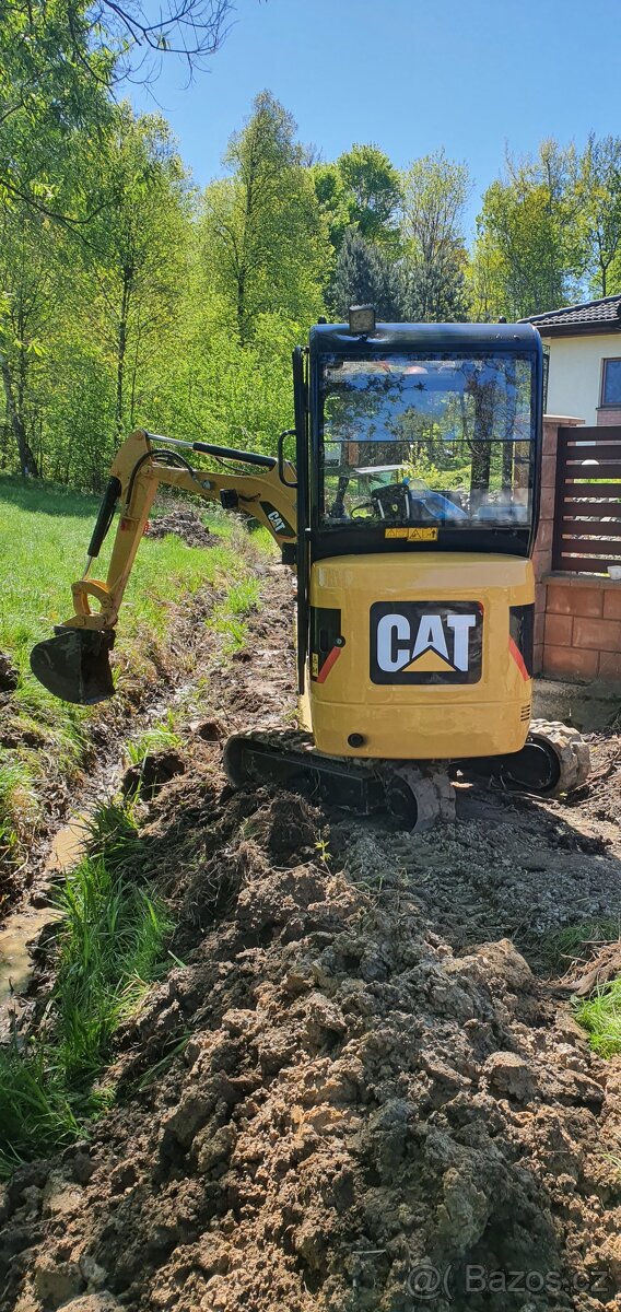 pasovy bagr Cat 301.4
